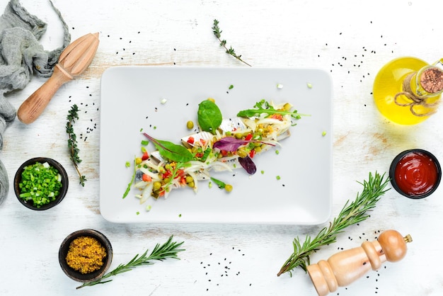 Chef preparing a dish on a wooden table
